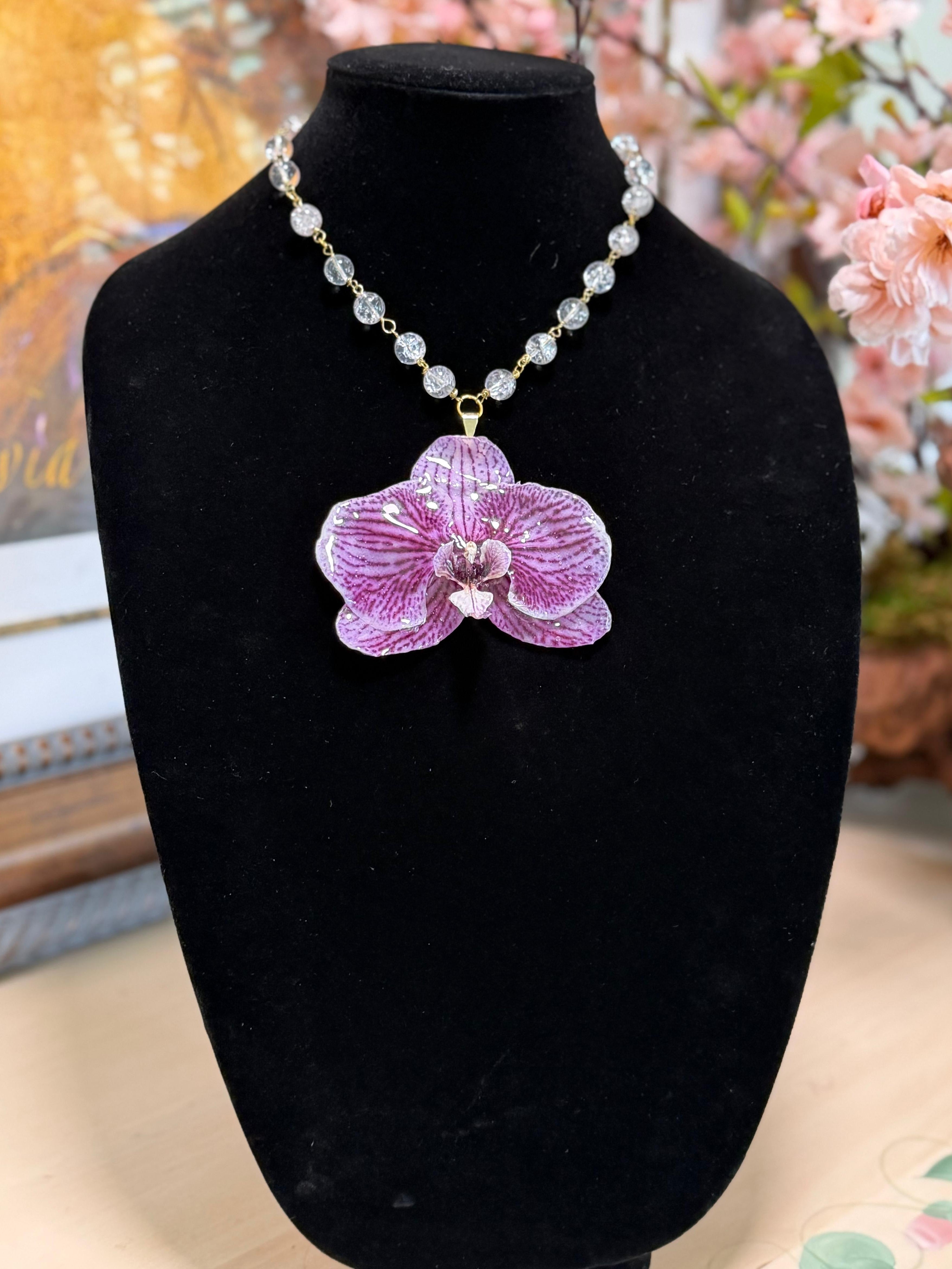 Natural Orchid Preserved in Resin and Mounted on a Handmade Transparent Beaded Chain
