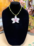 Natural Orchid Preserved in Resin Necklace with Green Beads & Gold-Tone Accents